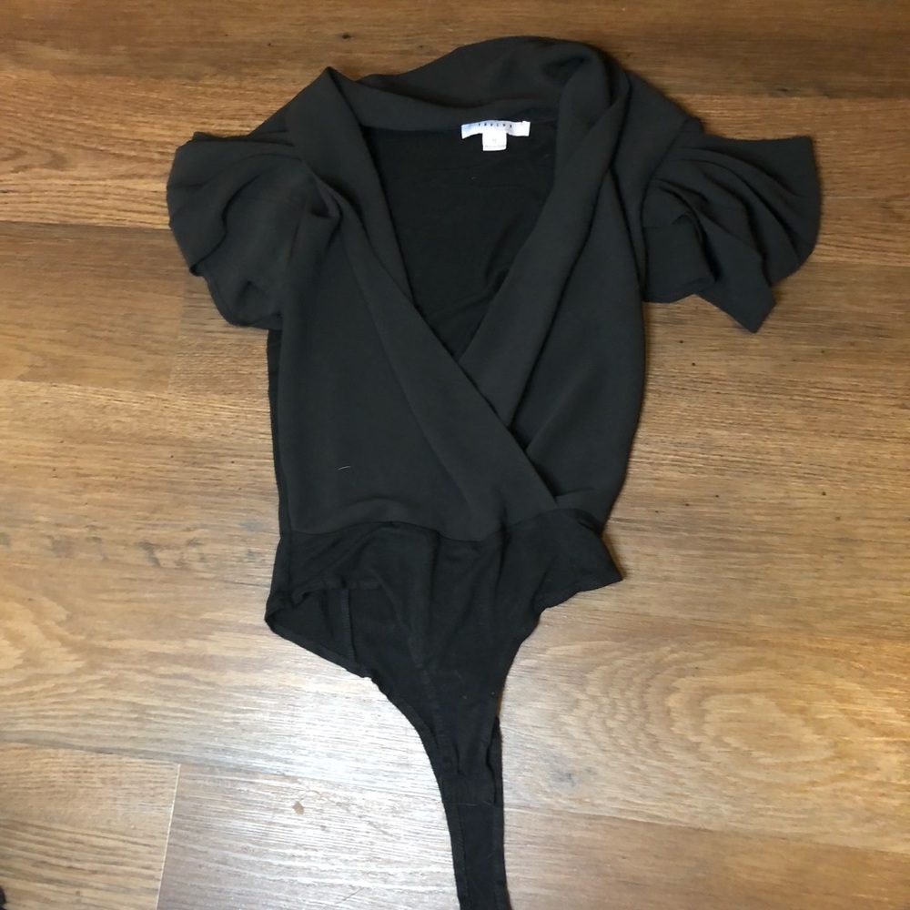 Low cut black body suit